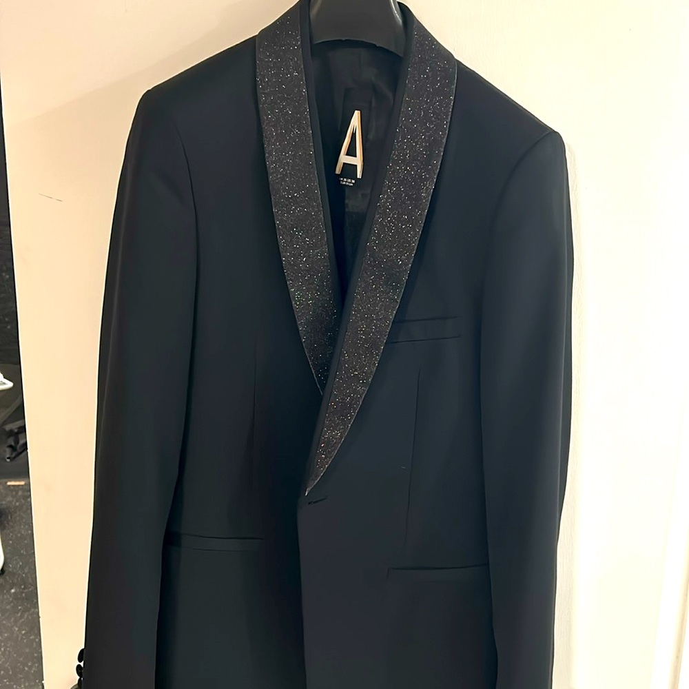 Top man tuxedo one button jacket. Blazer with black sparkle lapel